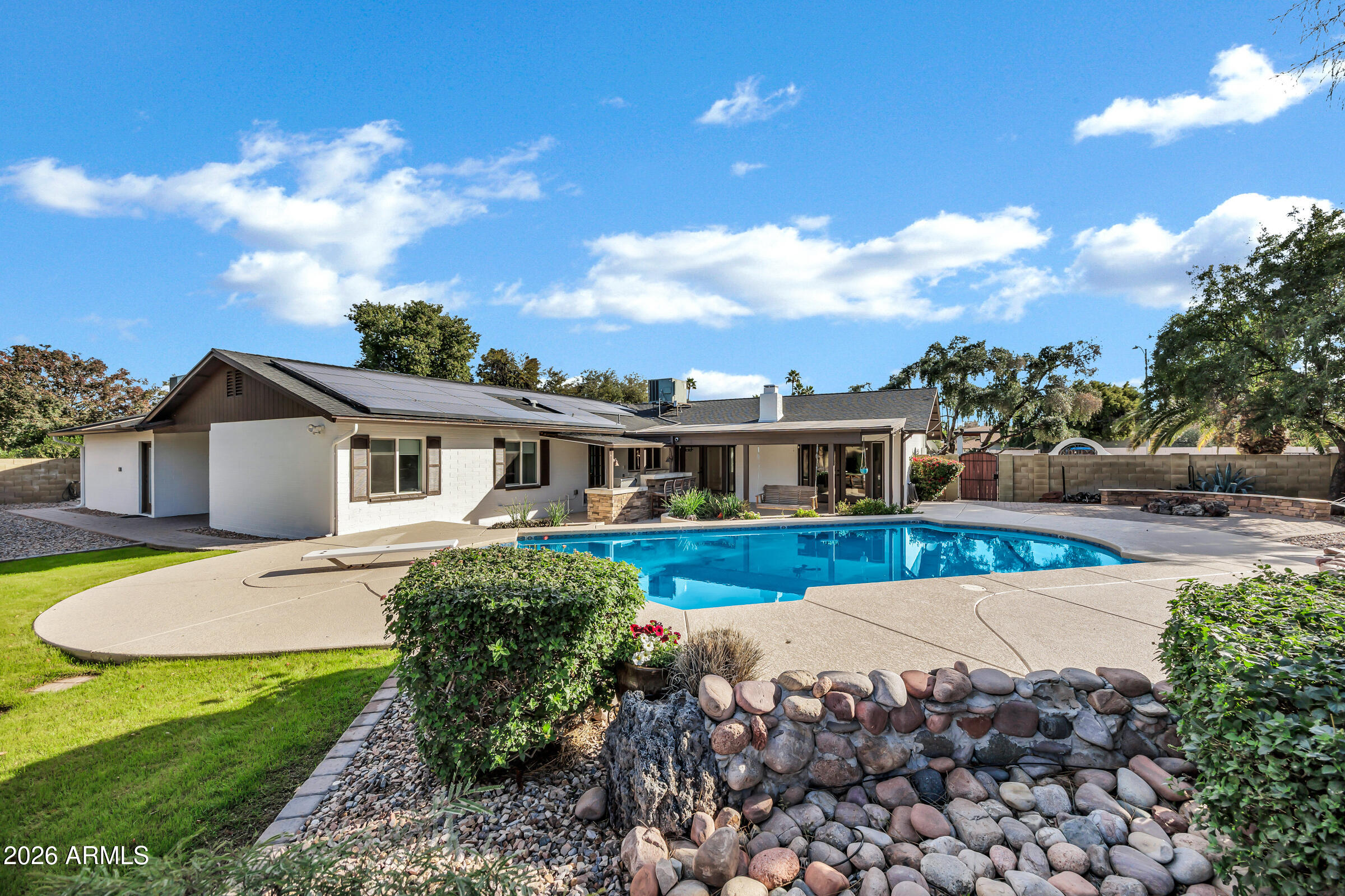 11202 North 42nd Place Phoenix, AZ 85028 - Photo 35 of 55 a front view of a house with garden