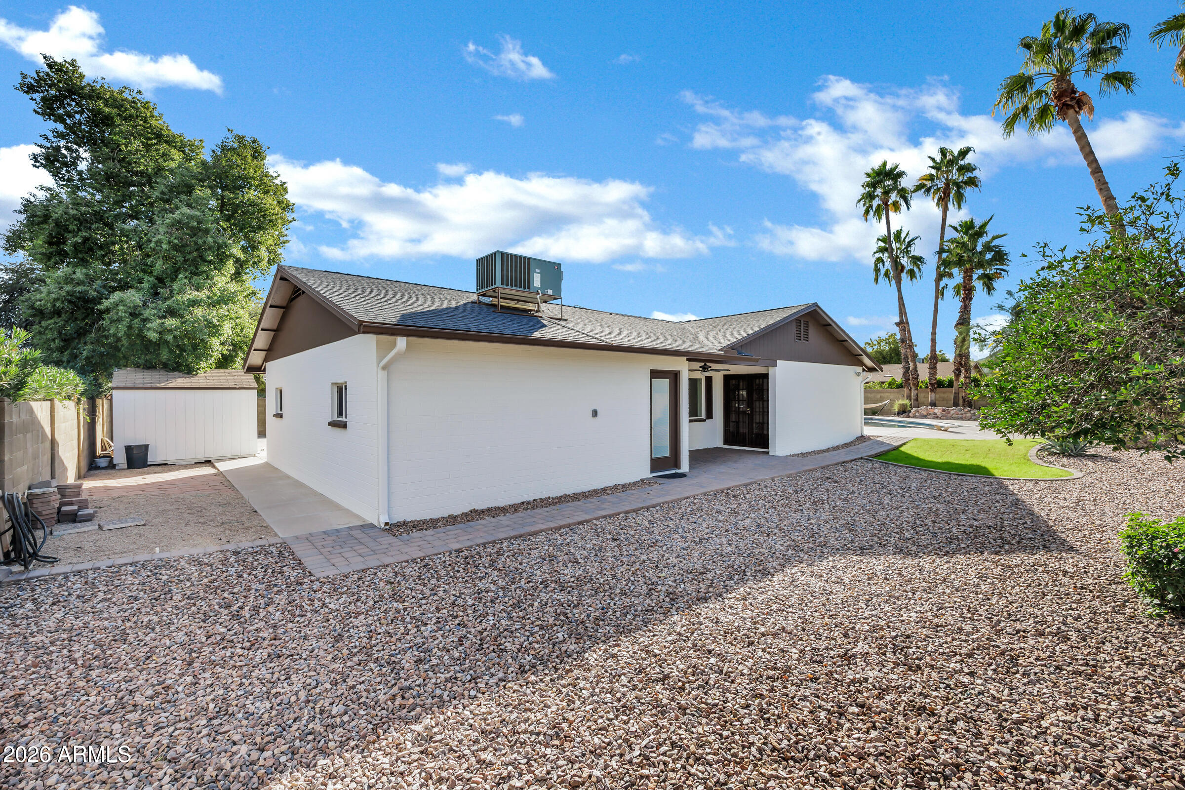 11202 North 42nd Place Phoenix, AZ 85028 - Photo 36 of 55 a view of a house with a yard