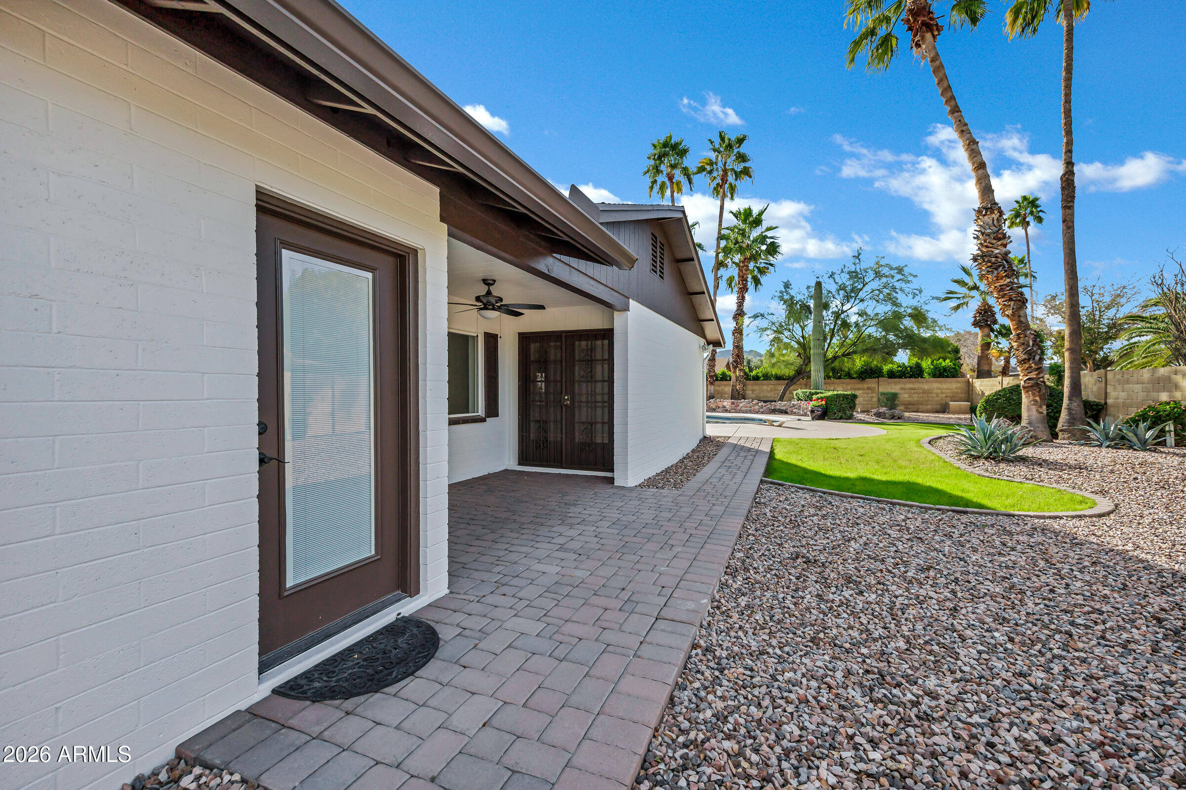 11202 North 42nd Place Phoenix, AZ 85028 - Photo 39 of 55 a view of a house with a backyard