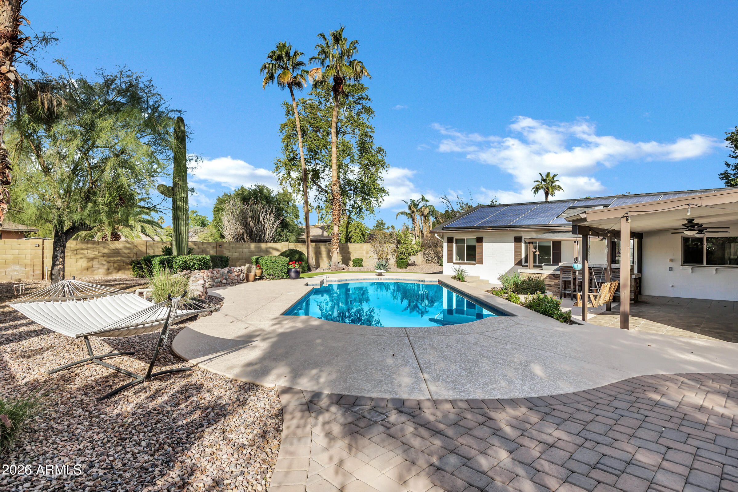 11202 North 42nd Place Phoenix, AZ 85028 - Photo 42 of 55 a view of a house with backyard and sitting area