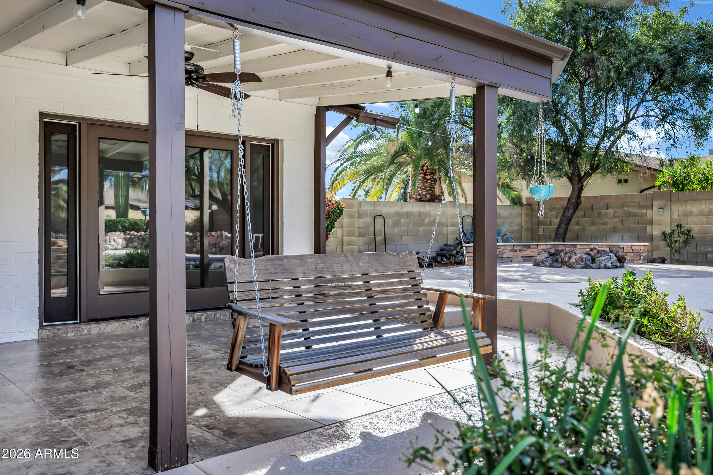 11202 North 42nd Place Phoenix, AZ 85028 - Photo 43 of 55 a view of a bench in the patio