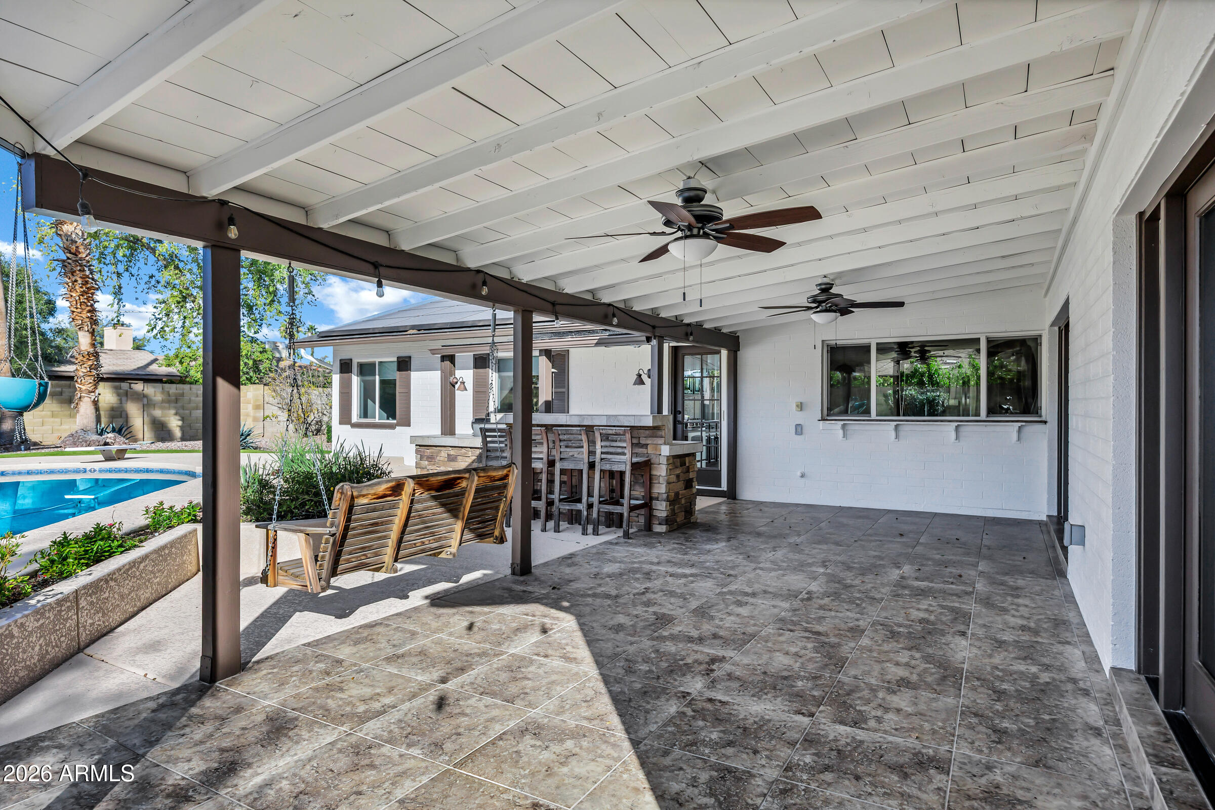 11202 North 42nd Place Phoenix, AZ 85028 - Photo 46 of 55 an empty room with furniture and a large window