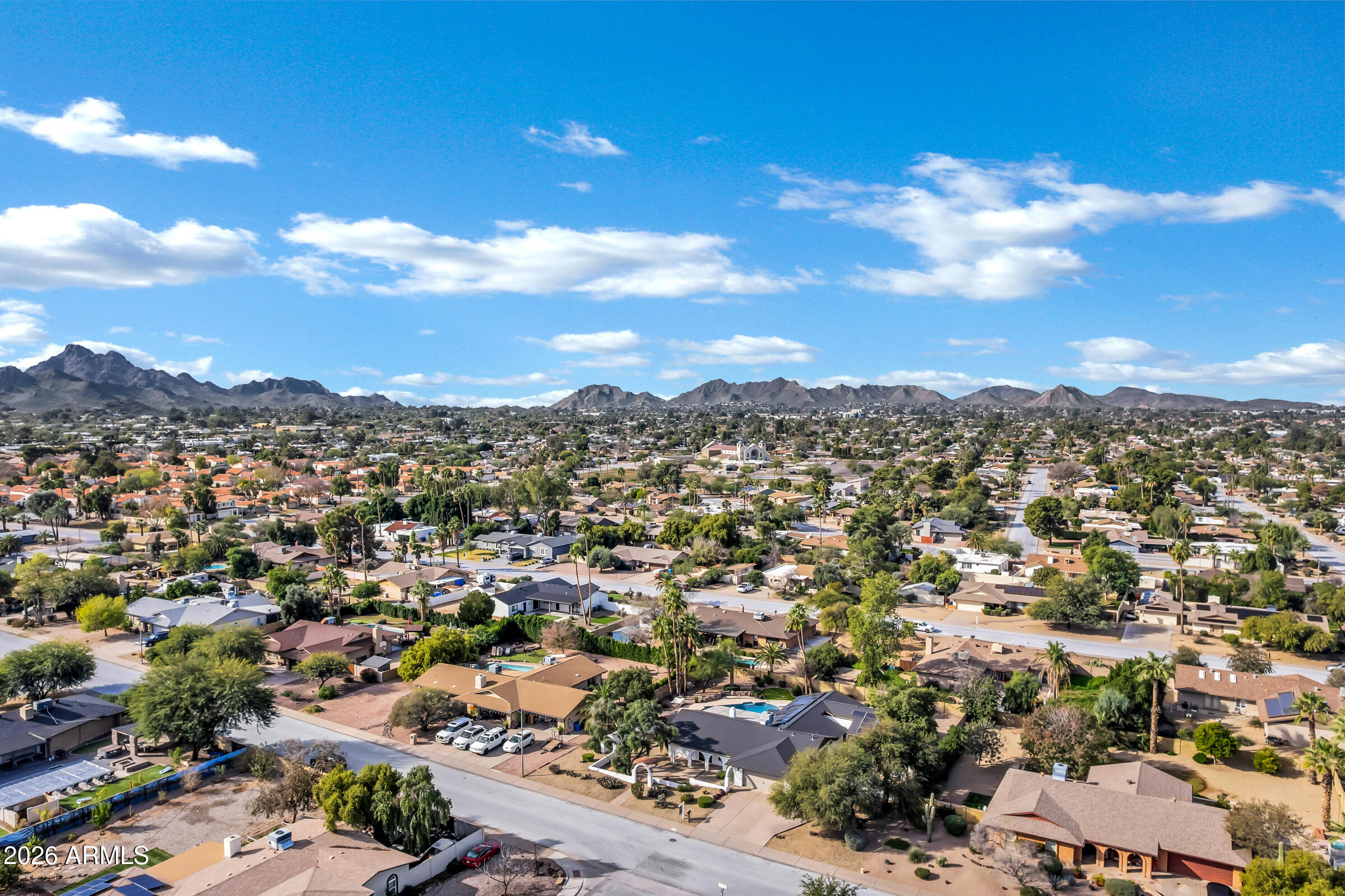 11202 North 42nd Place Phoenix, AZ 85028 - Photo 50 of 55 an aerial view of residential houses with outdoor space