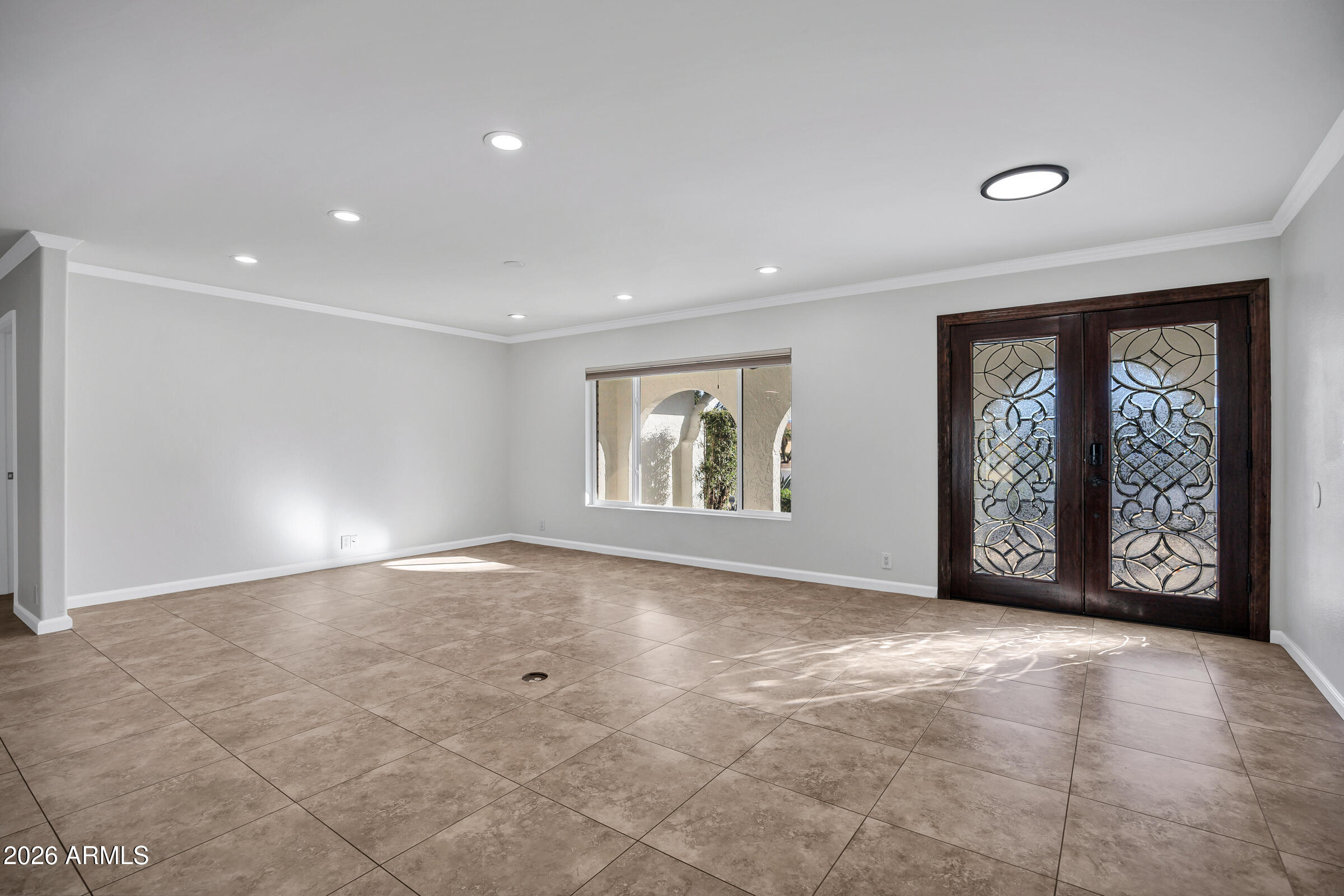 11202 North 42nd Place Phoenix, AZ 85028 - Photo 7 of 55 a view of an empty room with a window