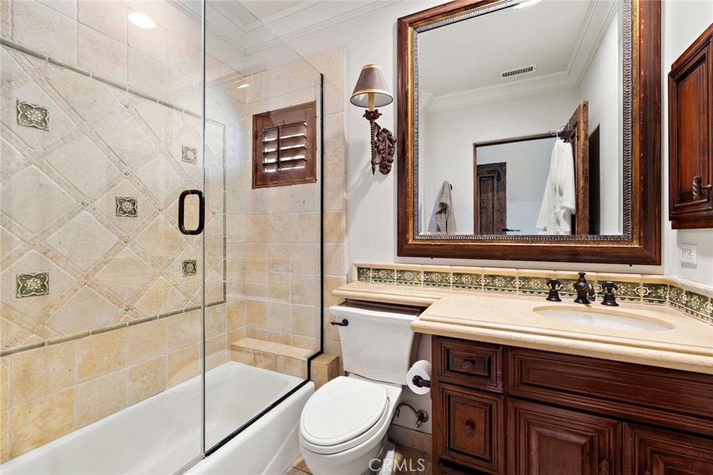 5 Via Monarca Street Dana Point, CA 92629 - Photo 33 of 64 a bathroom with a sink a toilet and shower
