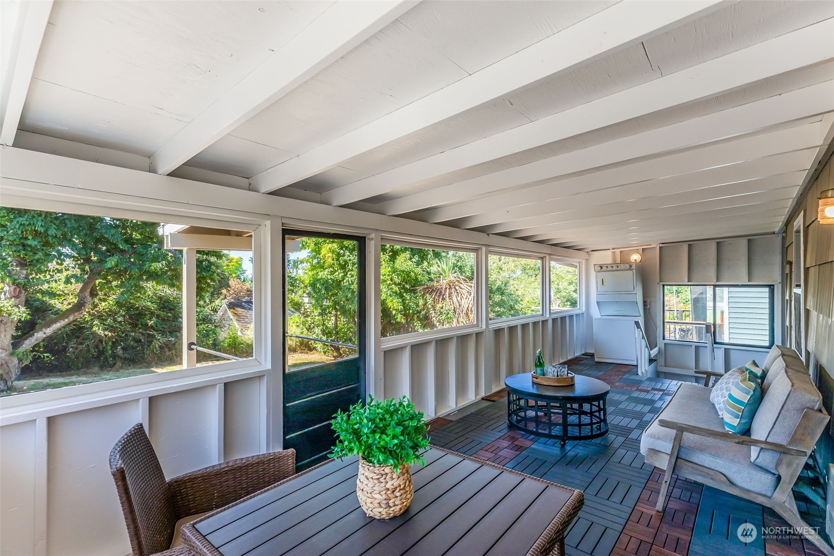 3525 Southwest Webster Street Seattle, WA 98126 - Photo 25 of 37 a view of a porch with furniture and wooden floor