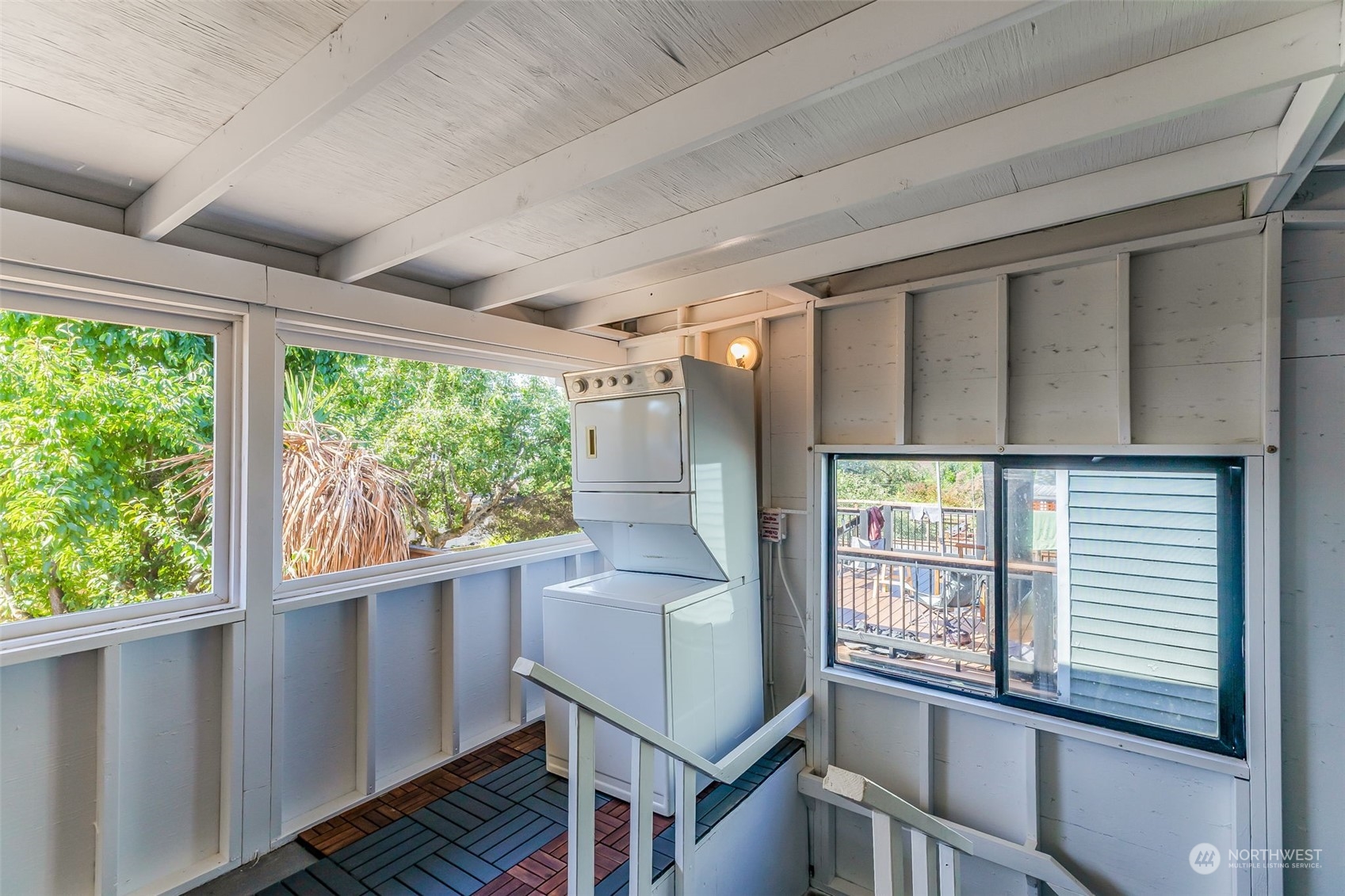 3525 Southwest Webster Street Seattle, WA 98126 - Photo 28 of 37 a view of a kitchen with wooden floor and a window