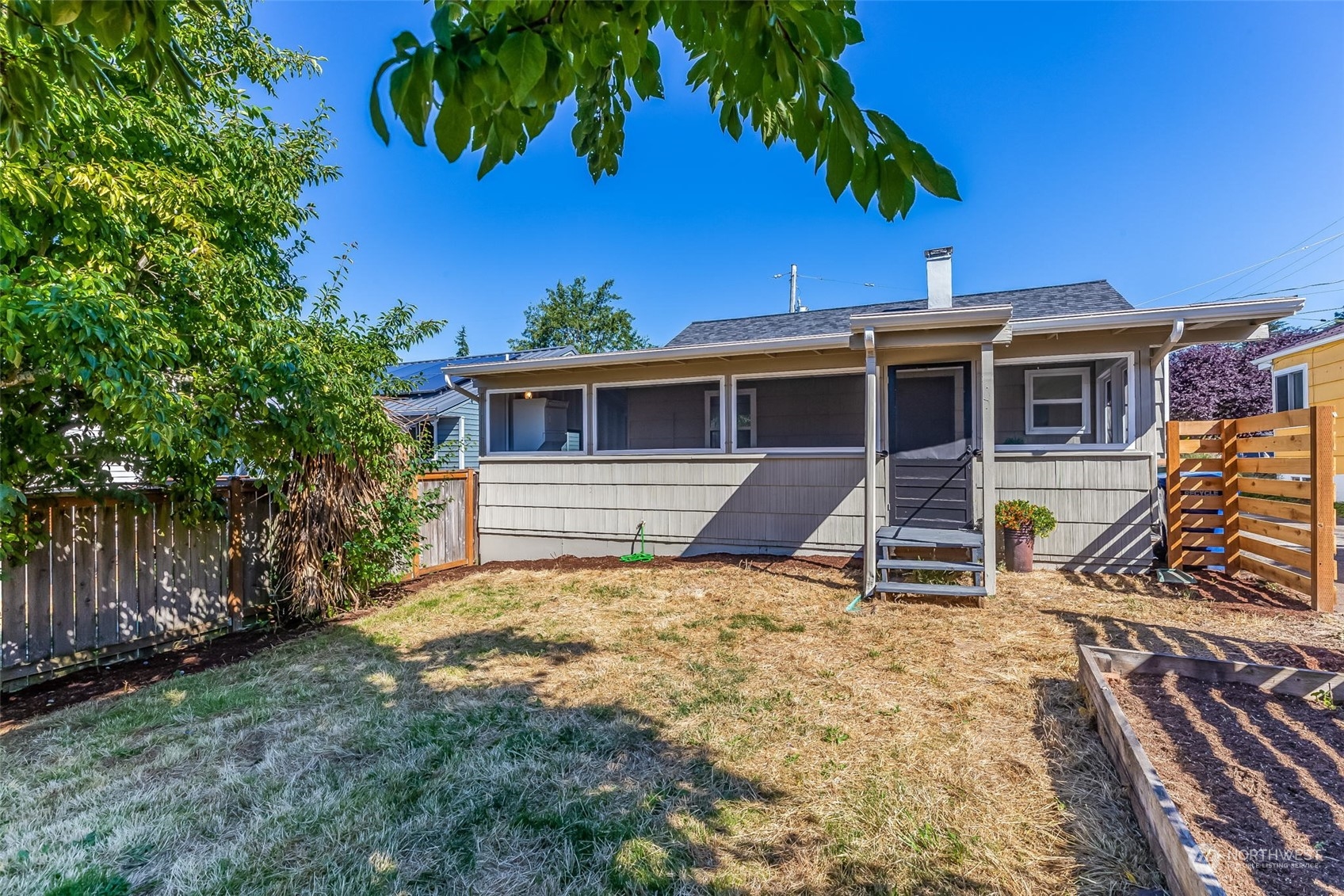 3525 Southwest Webster Street Seattle, WA 98126 - Photo 33 of 37 a view of a house with a patio