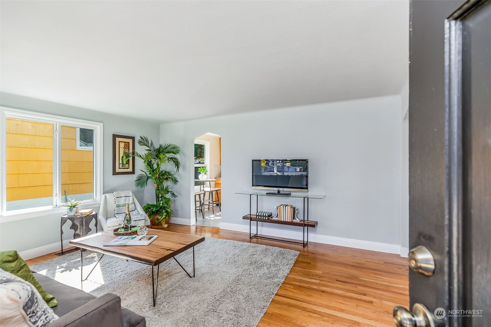 3525 Southwest Webster Street Seattle, WA 98126 - Photo 5 of 37 a living room with furniture a window and a table