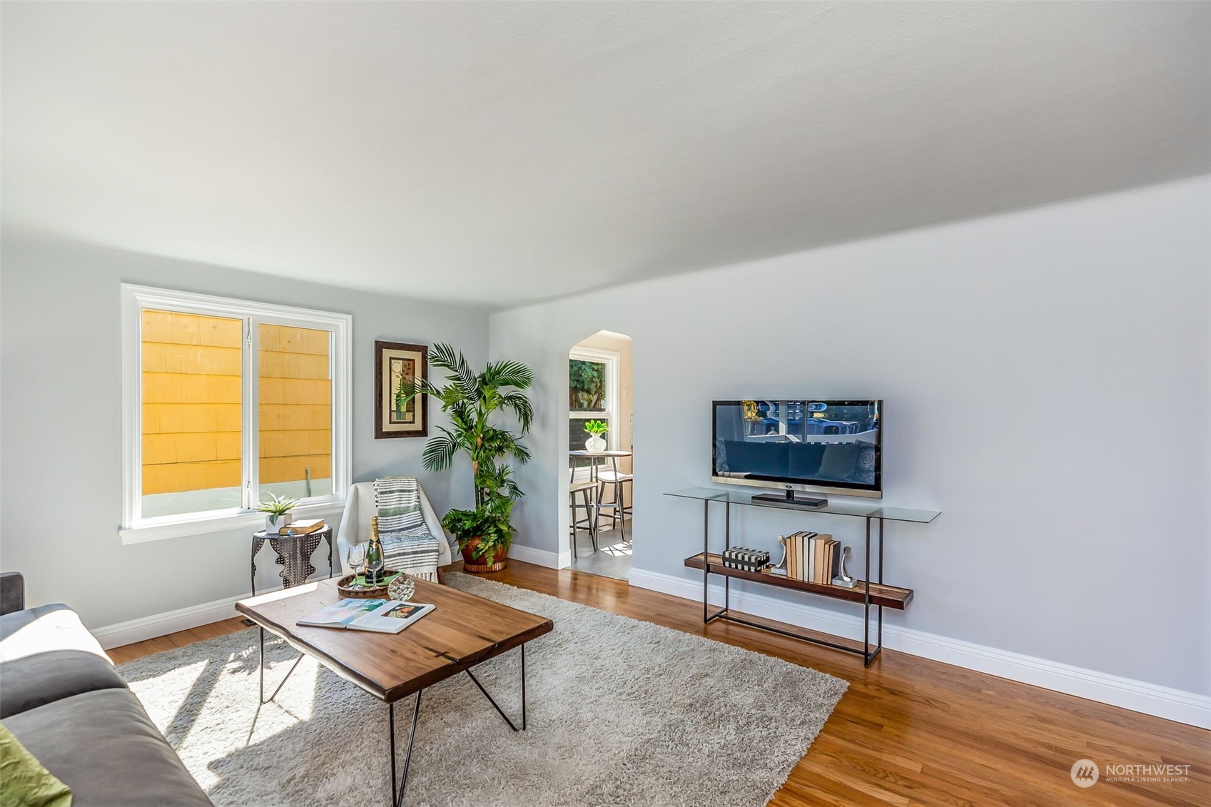 3525 Southwest Webster Street Seattle, WA 98126 - Photo 6 of 37 a living room with furniture and a flat screen tv