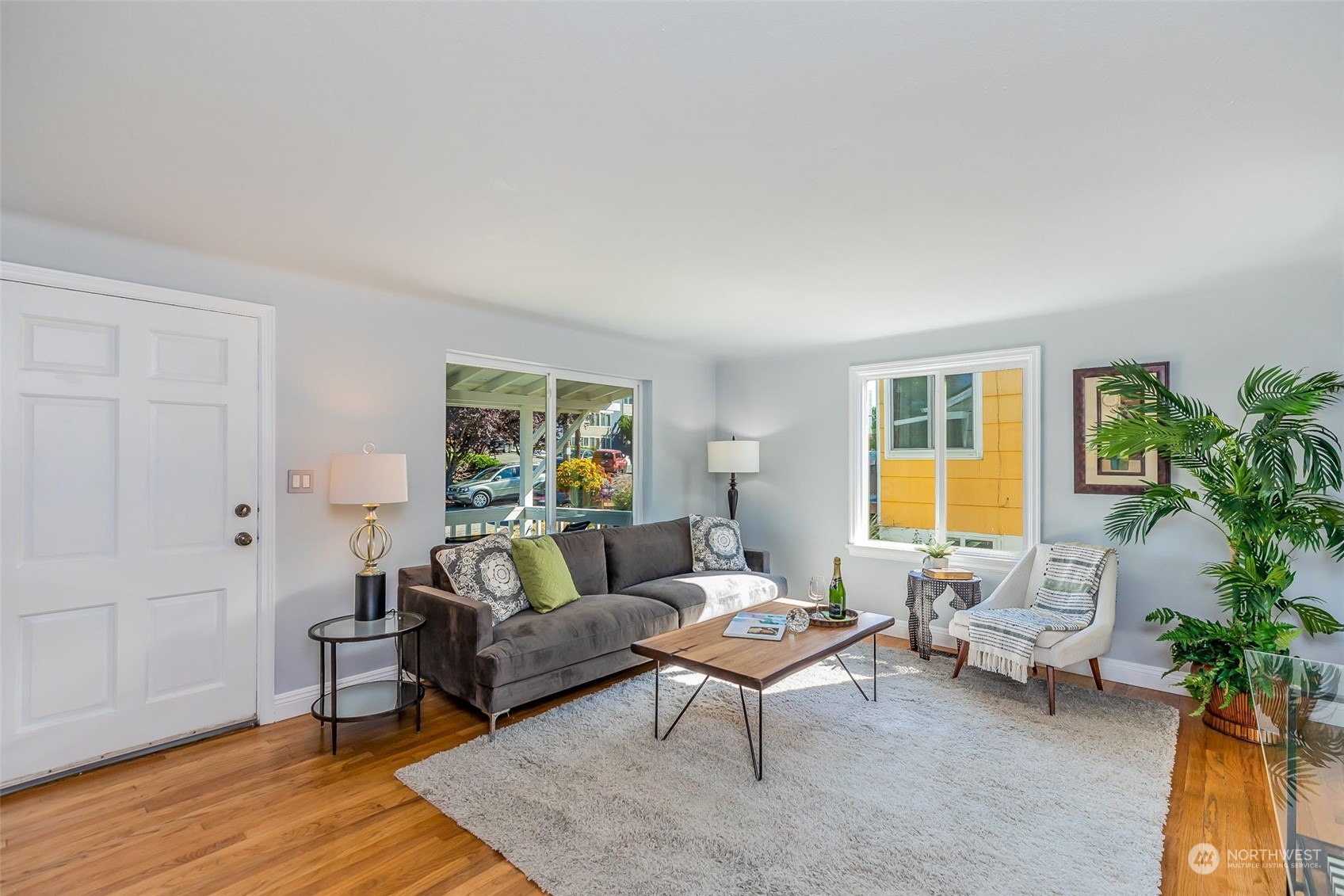 3525 Southwest Webster Street Seattle, WA 98126 - Photo 7 of 37 a living room with furniture and a potted plant