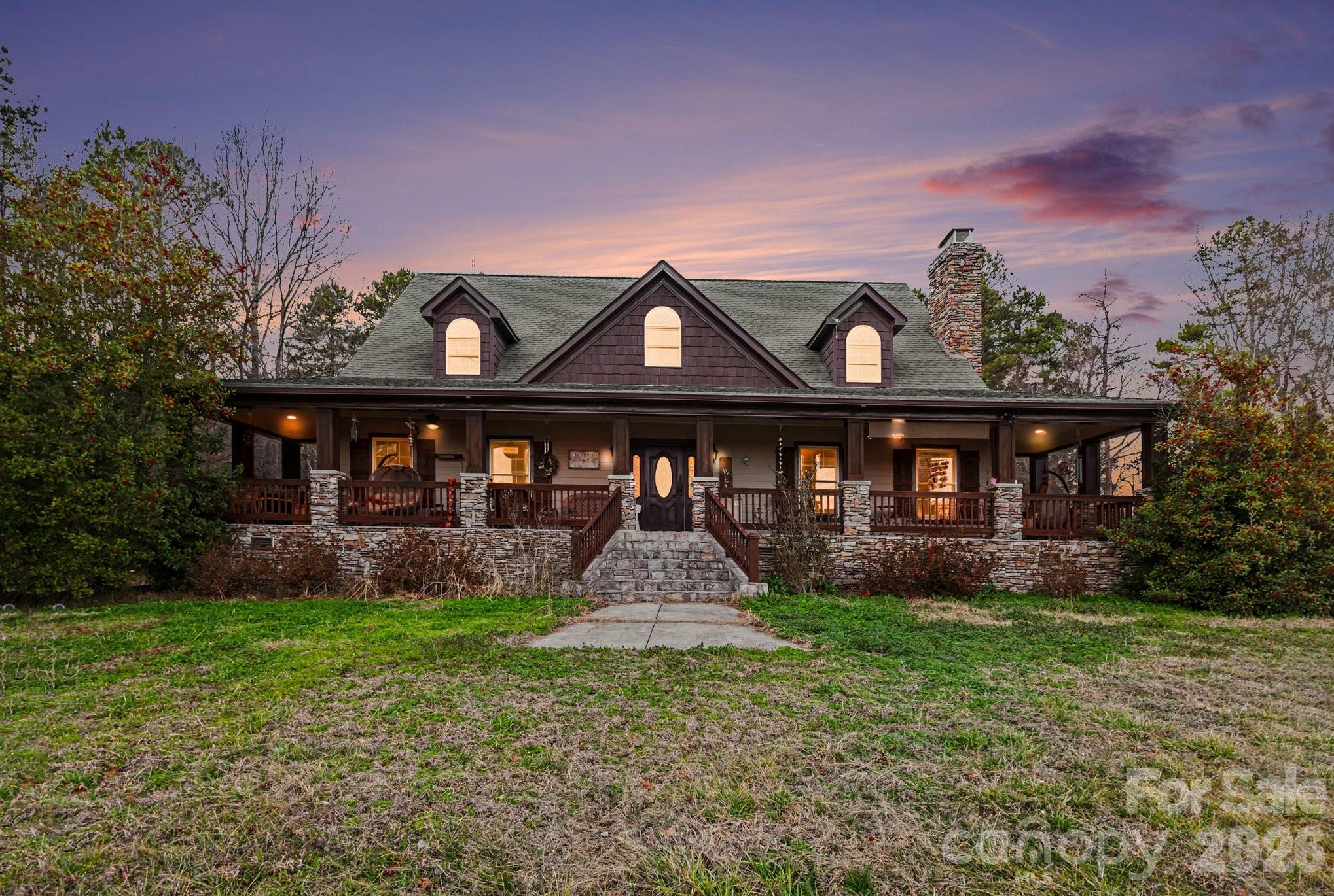 105 Eubanks Road Monroe, NC 28112 - Photo 2 of 41 a front view of a house with garden