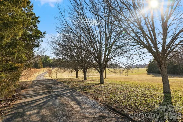 a view of yard and covered with snow