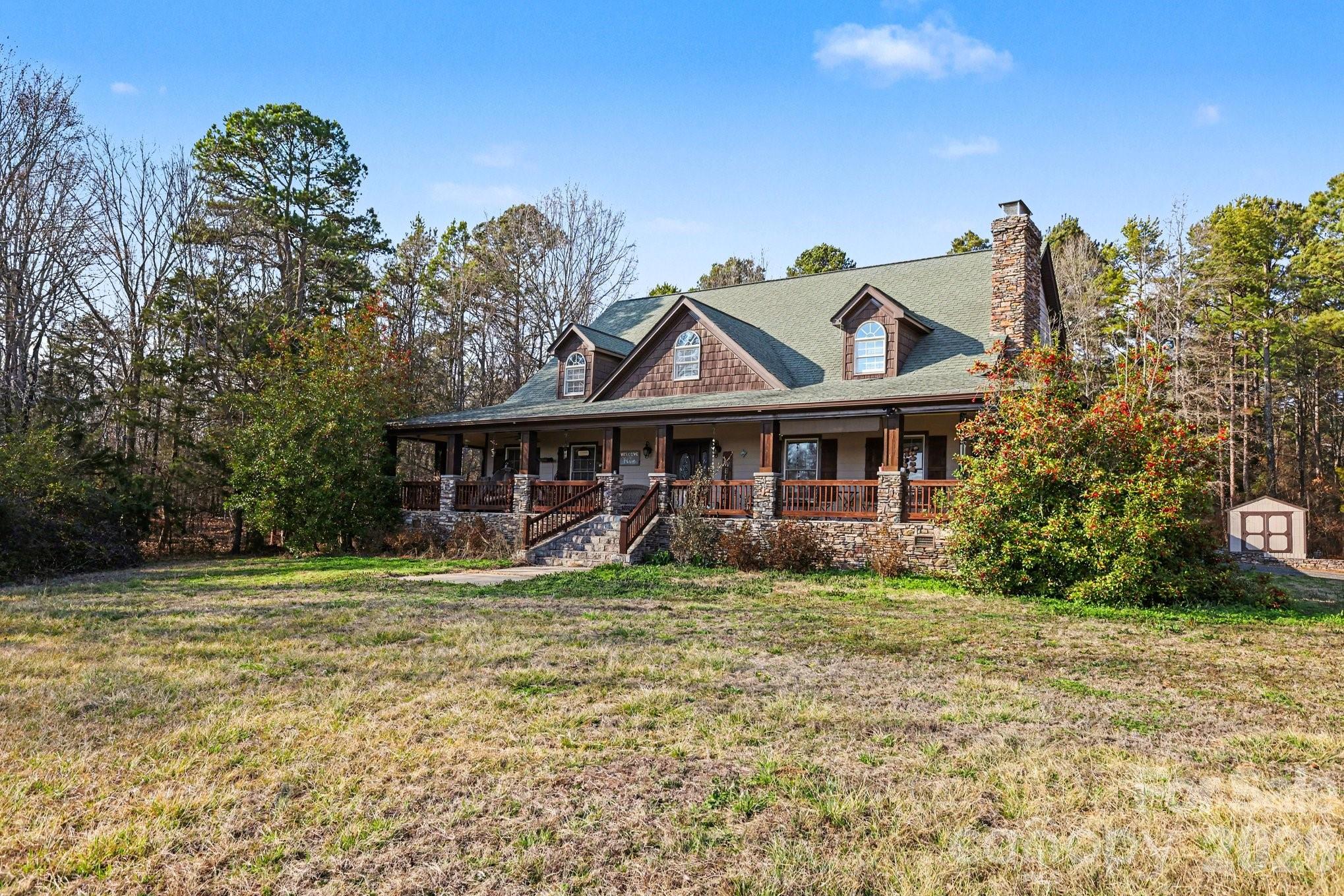 105 Eubanks Road Monroe, NC 28112 - Photo 40 of 41 a front view of a house with a garden