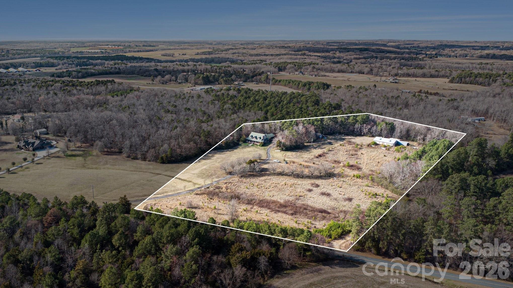105 Eubanks Road Monroe, NC 28112 - Photo 5 of 41 a view of a backyard