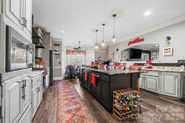 a kitchen view with lot of counter top space