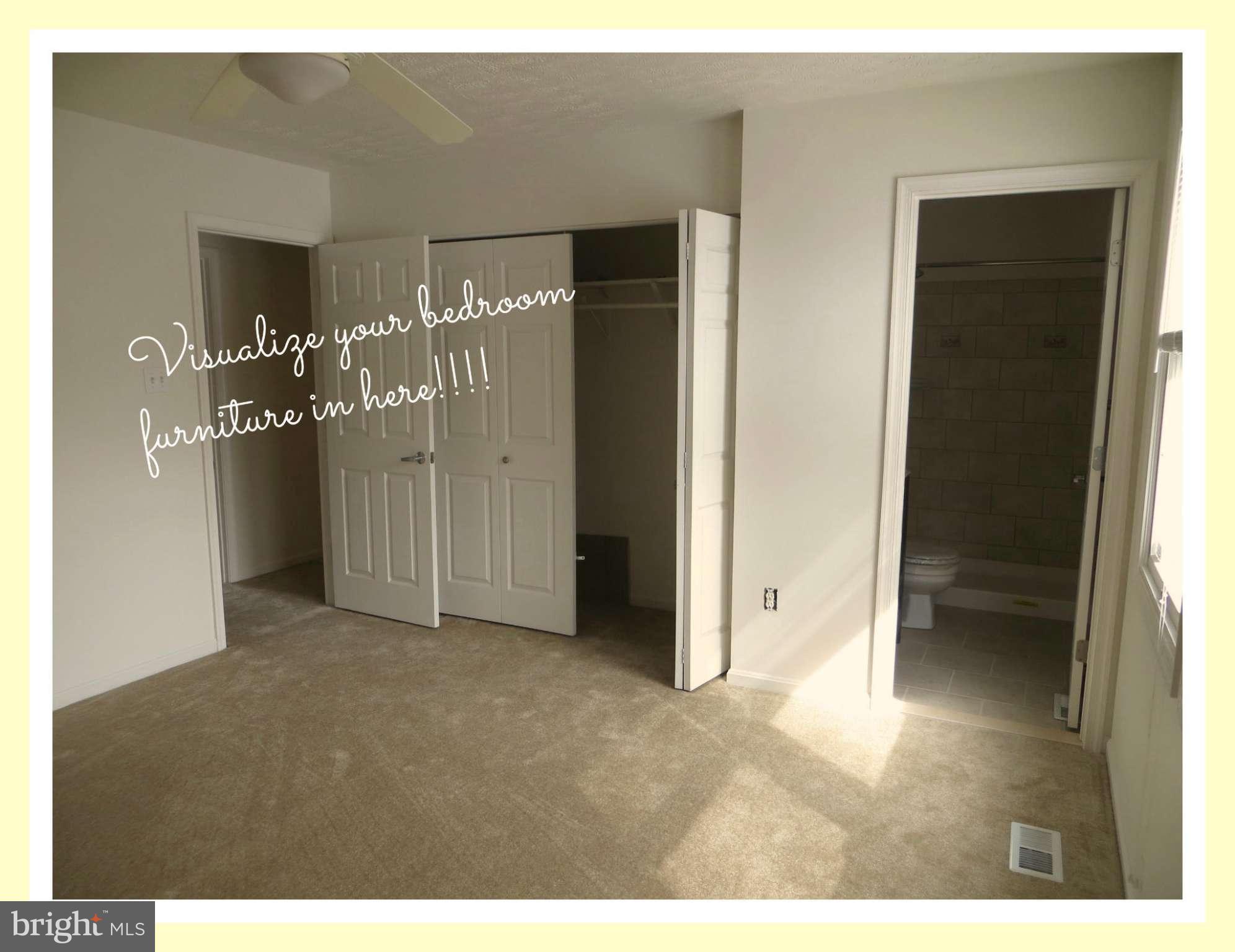 117 Sandhill Road Essex, MD 21221 - Photo 8 of 13 a view of an empty room with kitchen and a window