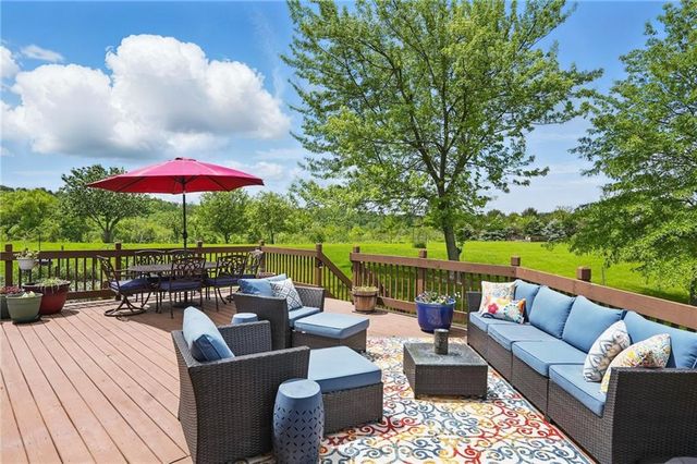 a view of balcony and garden