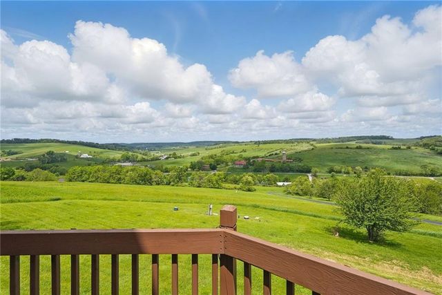 a view of a porch with a yard