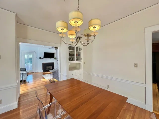 a bedroom with a bed and a table in it