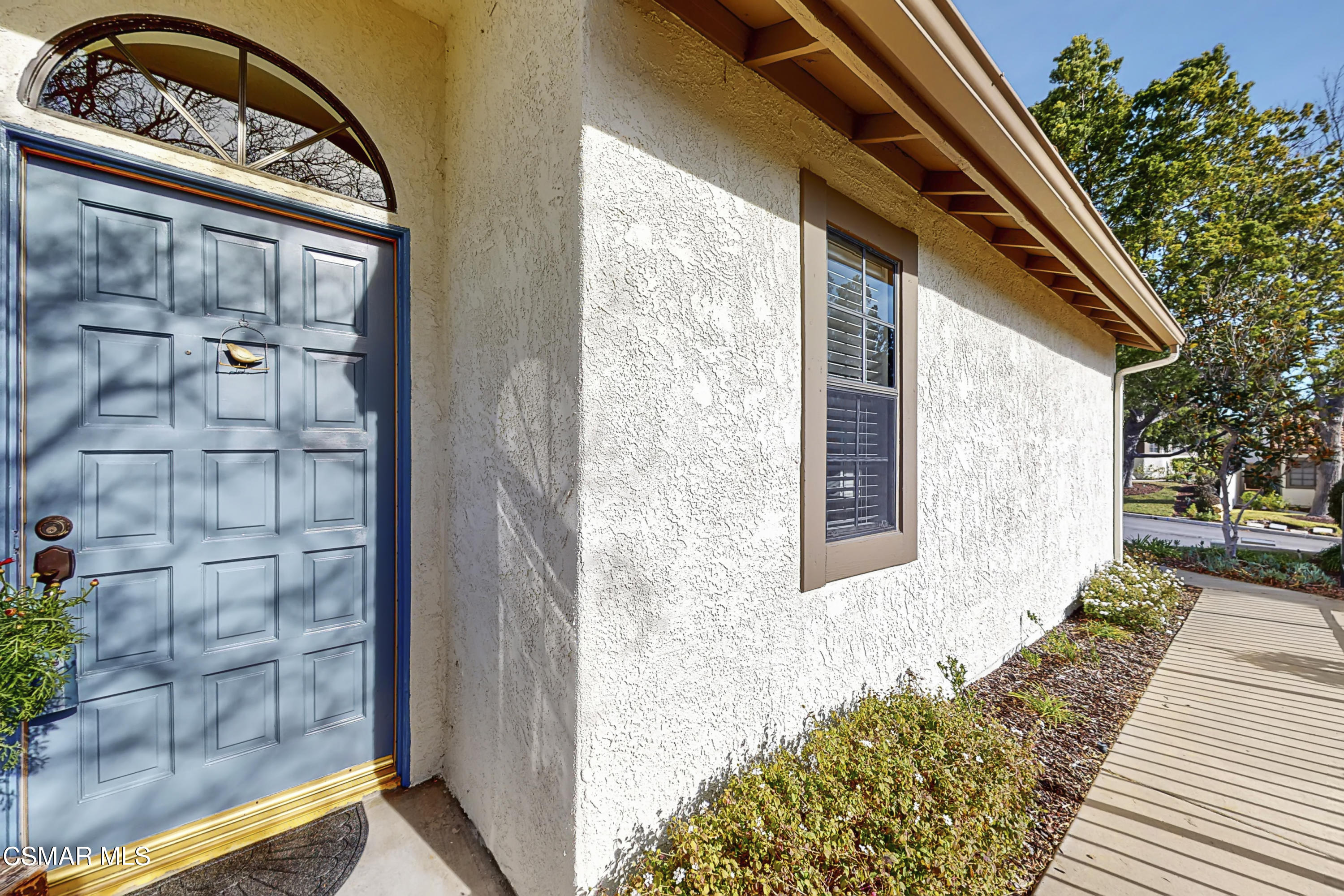 657 Cartpath Place Simi Valley, CA 93065 - Photo 22 of 50 a view of a balcony with a potted plant