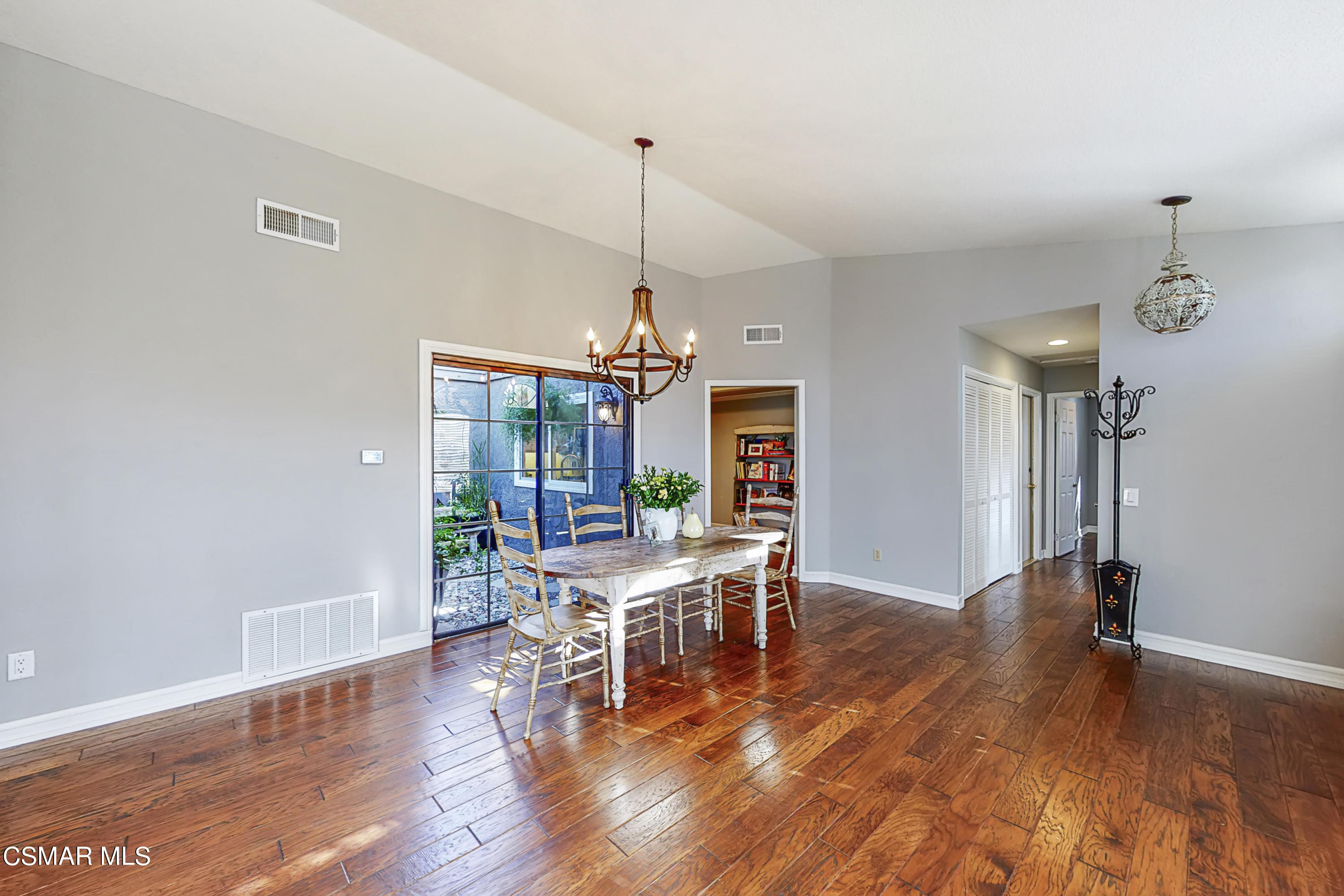 657 Cartpath Place Simi Valley, CA 93065 - Photo 35 of 50 a view of a dining room with furniture window and wooden floor