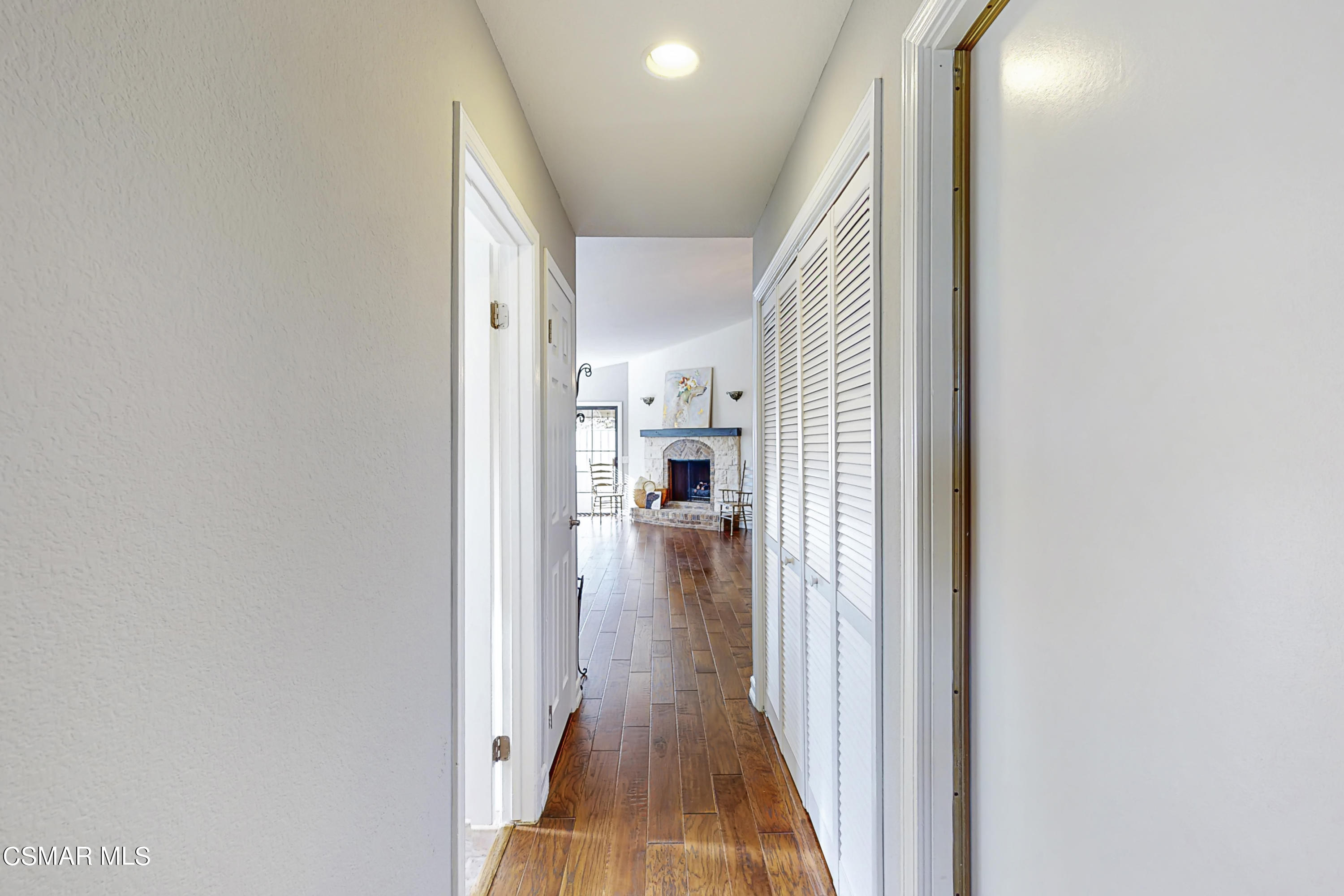 657 Cartpath Place Simi Valley, CA 93065 - Photo 40 of 50 a view of a hallway with wooden floor windows and livingroom