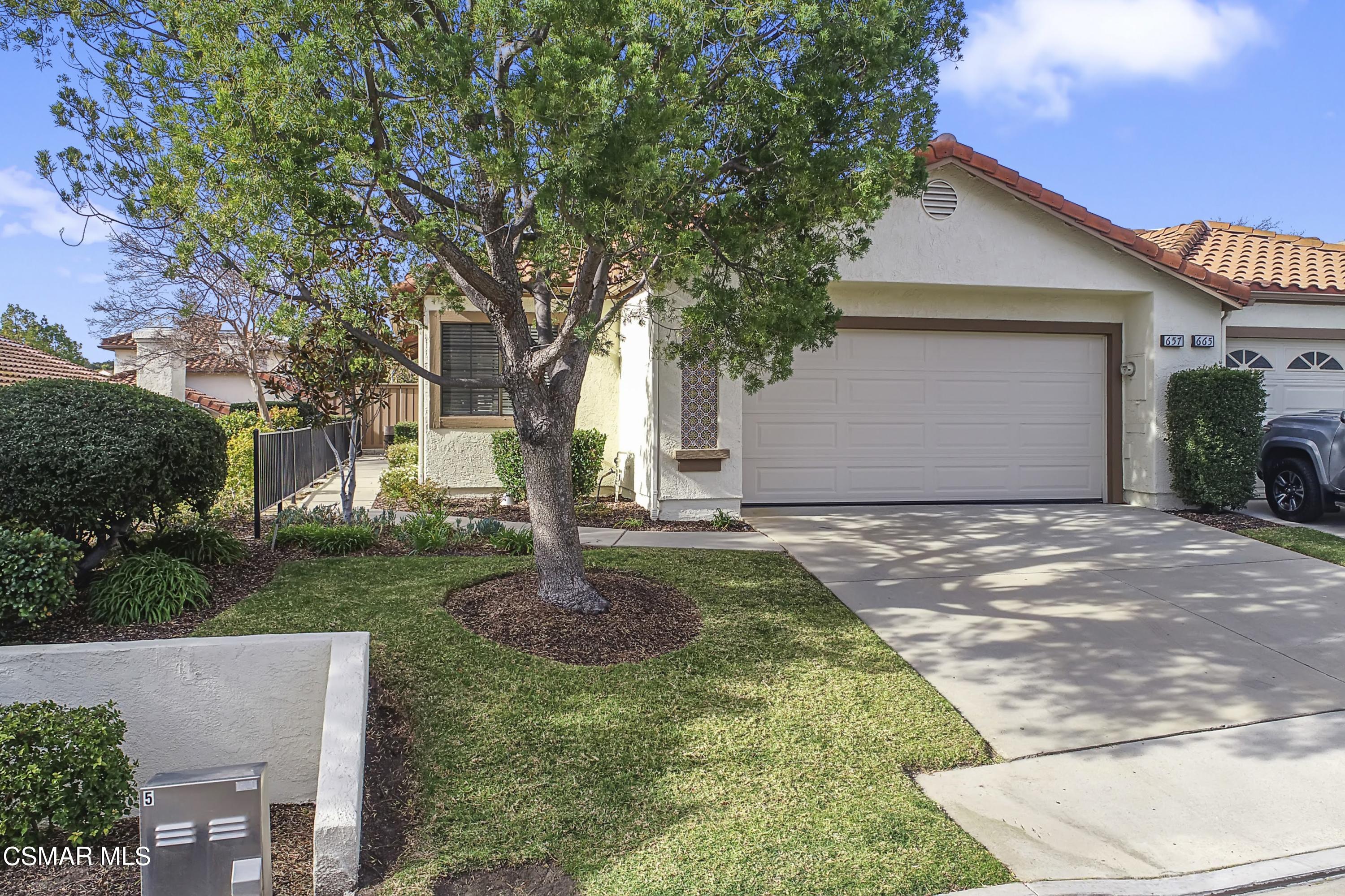 657 Cartpath Place Simi Valley, CA 93065 - Photo 46 of 50 a front view of a house with garden