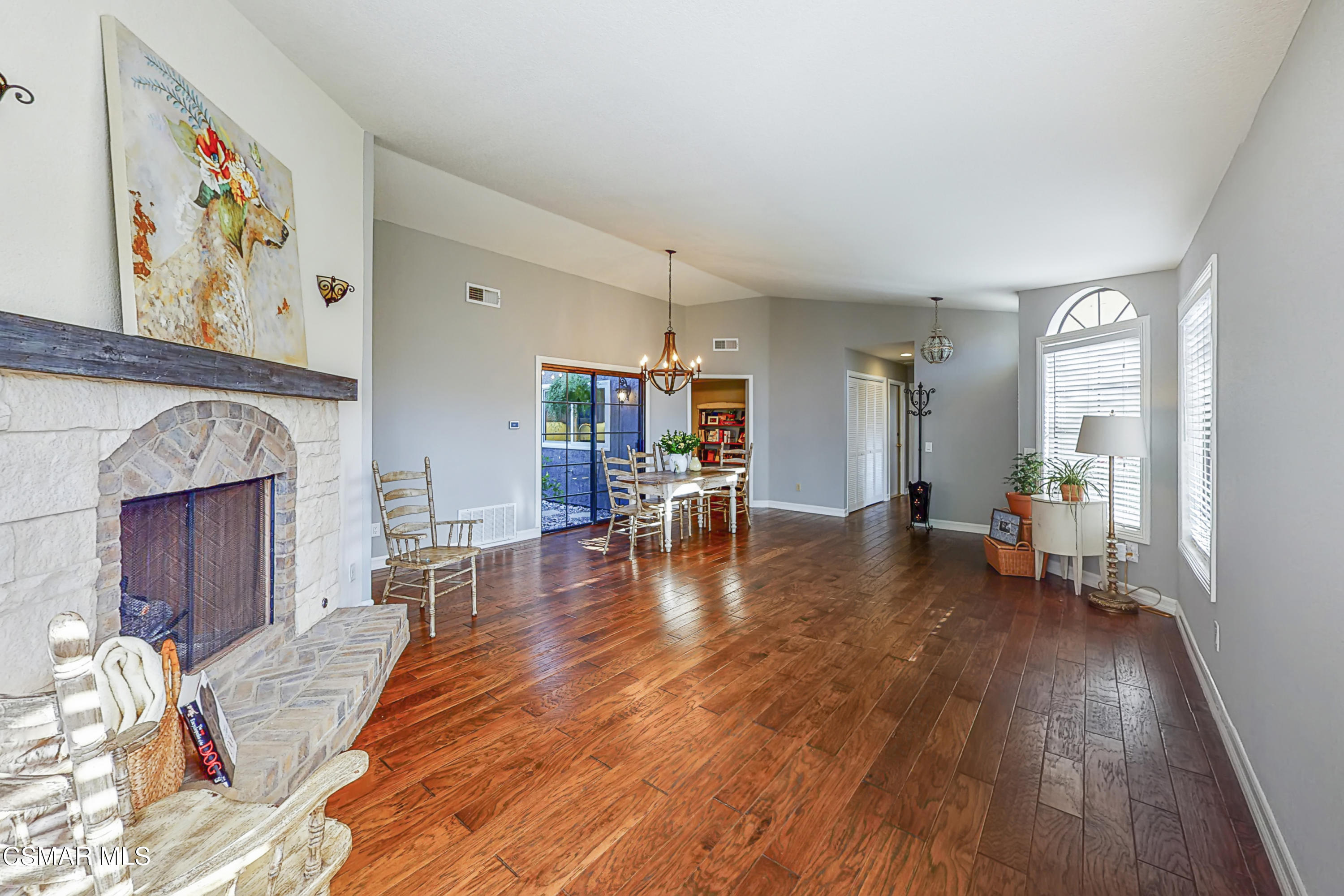657 Cartpath Place Simi Valley, CA 93065 - Photo 7 of 50 a view of a livingroom with furniture and a fireplace