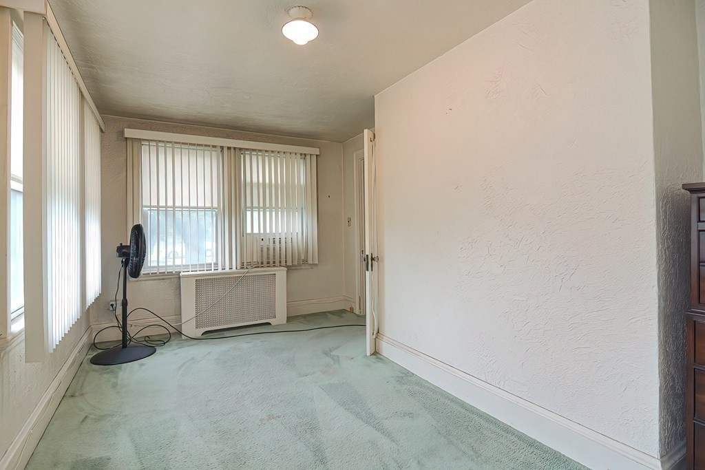 206 Concord Avenue Belmont, MA 02478 - Photo 16 of 18 an empty room with windows