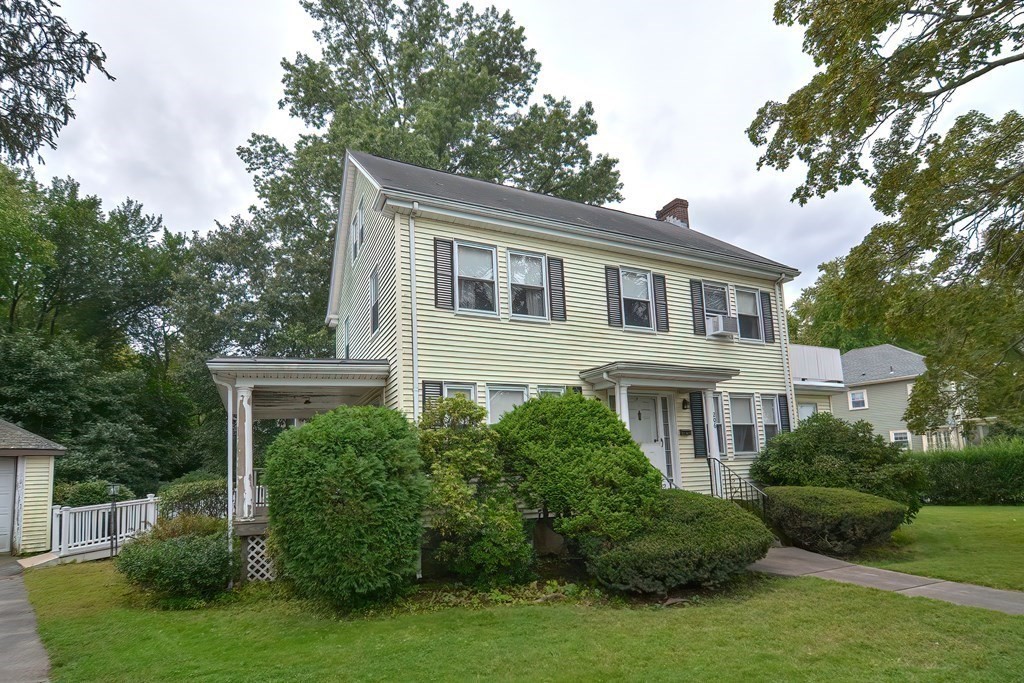 206 Concord Avenue Belmont, MA 02478 - Photo 18 of 18 a front view of a house with a garden