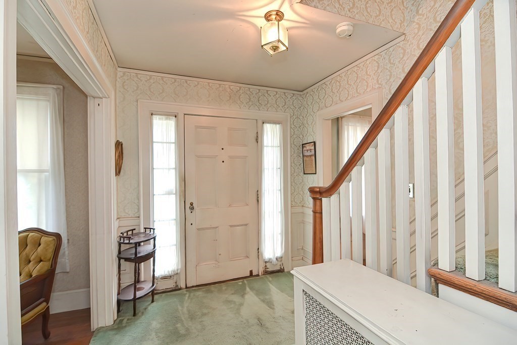 206 Concord Avenue Belmont, MA 02478 - Photo 4 of 18 a view of an entryway with staircase