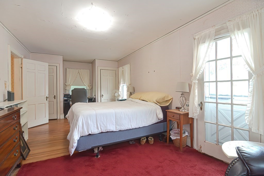 206 Concord Avenue Belmont, MA 02478 - Photo 8 of 18 a bedroom with a bed and a window