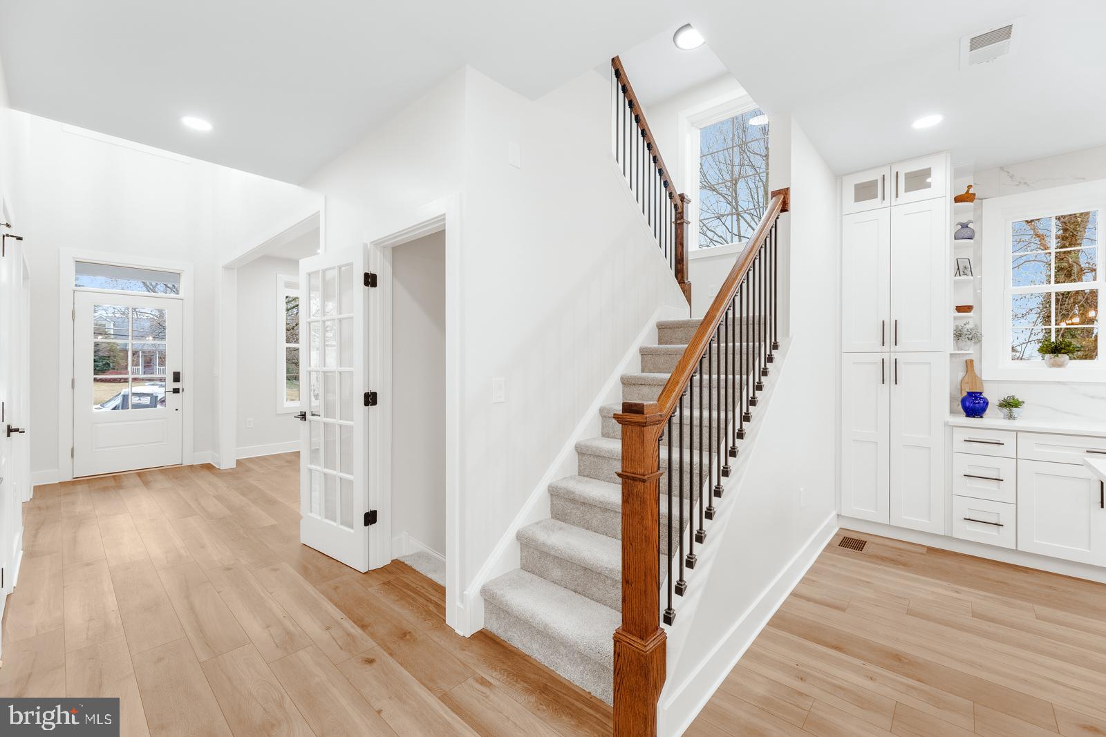 866 Hulmeville Road Langhorne, PA 19047 - Photo 24 of 63 a view of a hallway with wooden floor and staircase