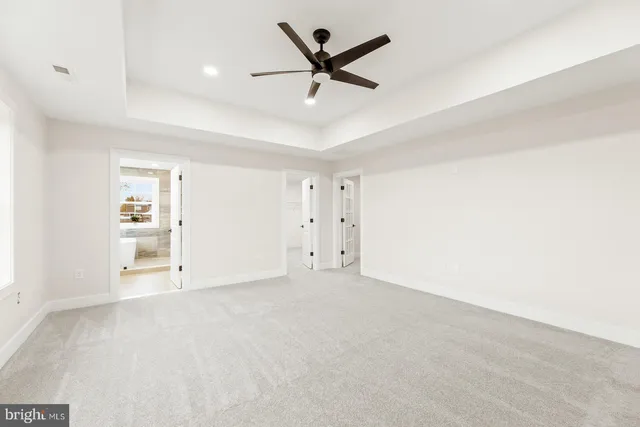 a bathroom with a bathtub and a sink