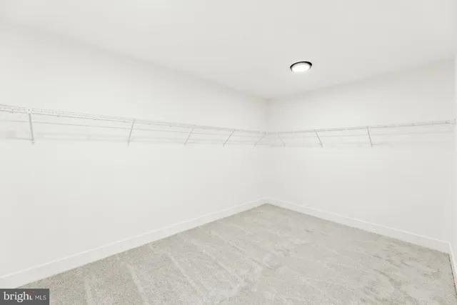 a bathroom with a tub and a shower