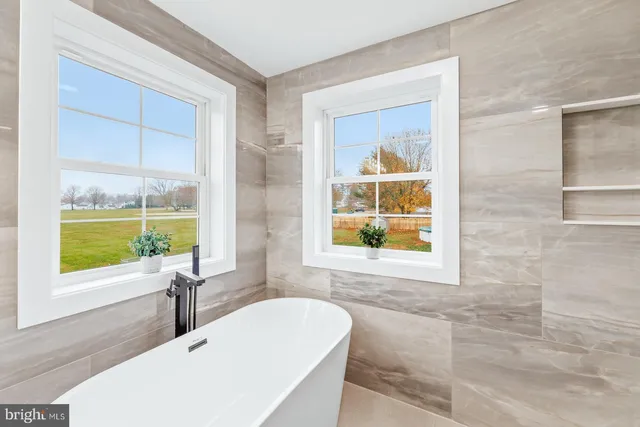 a view of room with wooden floor