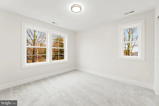 an empty room with a natural light
