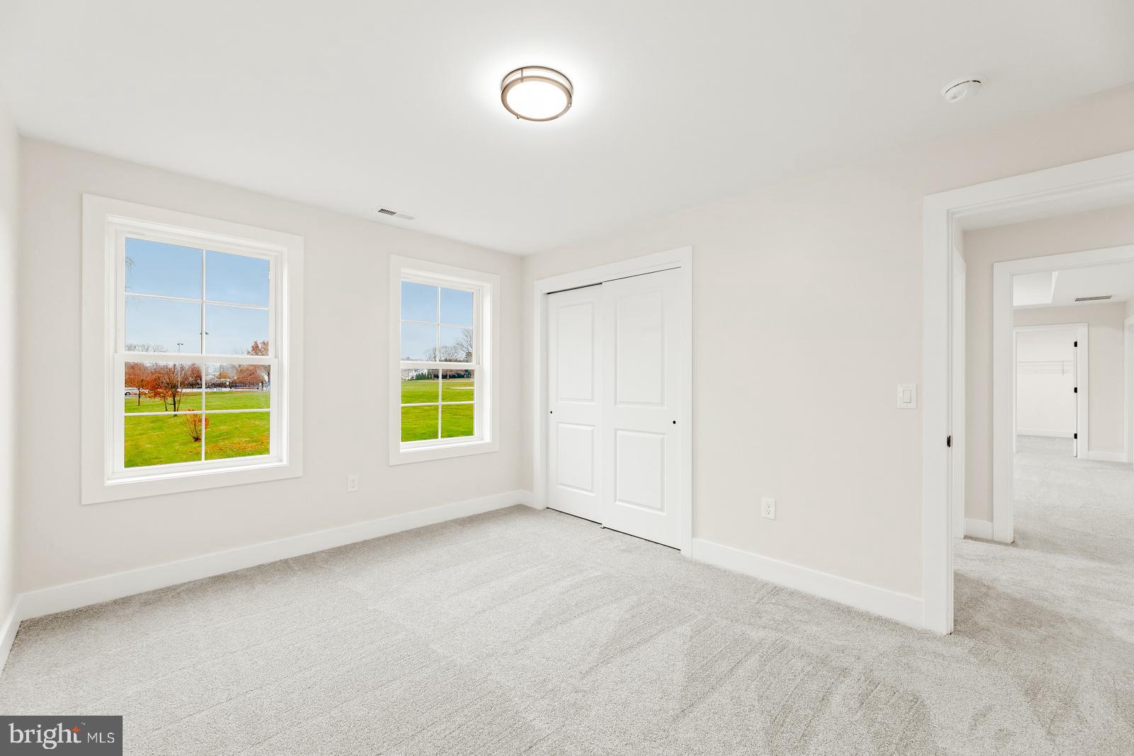 866 Hulmeville Road Langhorne, PA 19047 - Photo 43 of 63 an empty room with windows and mirror