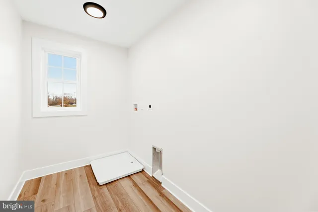 a view of a house with wooden deck