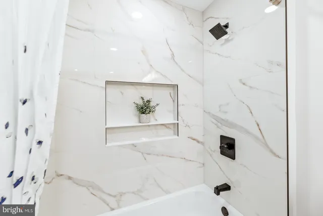 a view of a house with a large window