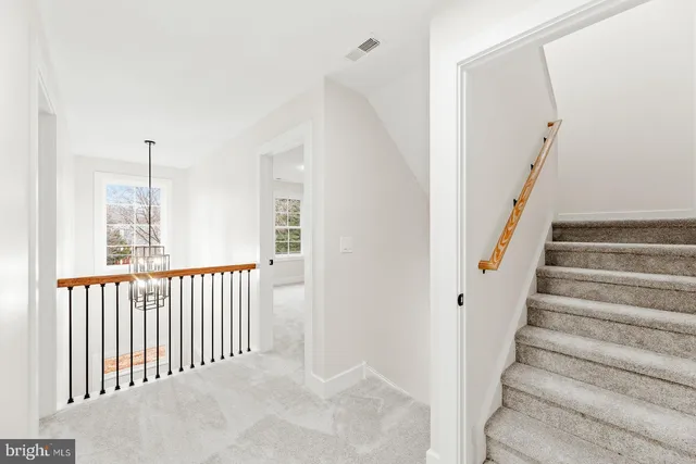 a view of a house with snow on the ground
