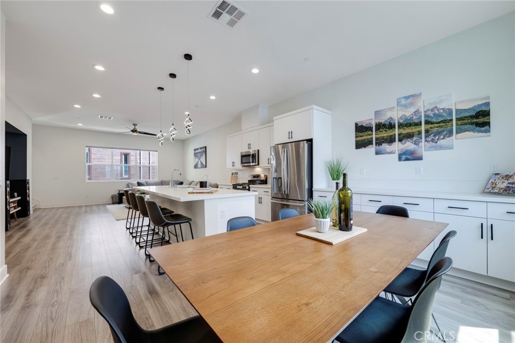 987 East Mason Lane, Unit 130 Anaheim, CA 92805 - Photo 20 of 48 Expansive dining, kitchen, and great room