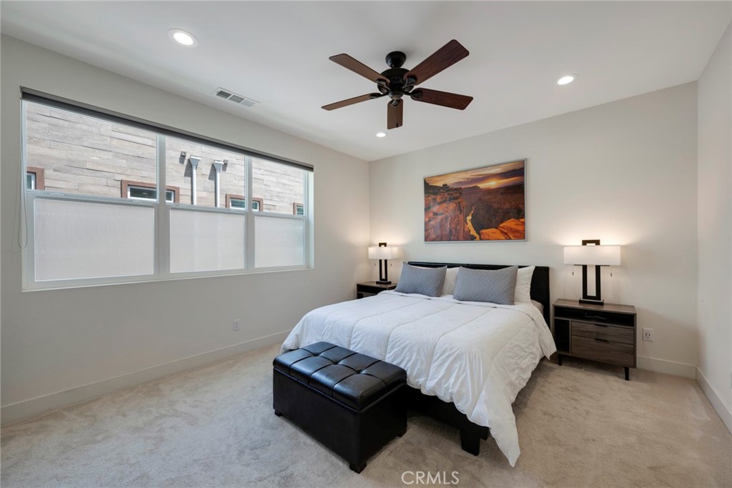 987 East Mason Lane, Unit 130 Anaheim, CA 92805 - Photo 3 of 48 En Suite Primary Bedroom