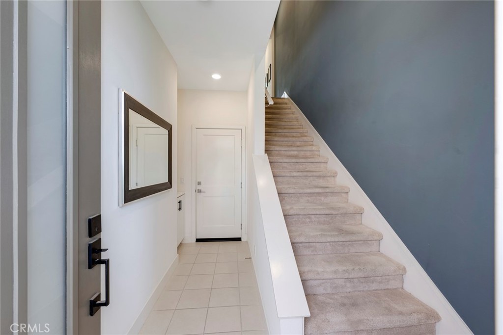 987 East Mason Lane, Unit 130 Anaheim, CA 92805 - Photo 10 of 48 Entry to two car attached garage