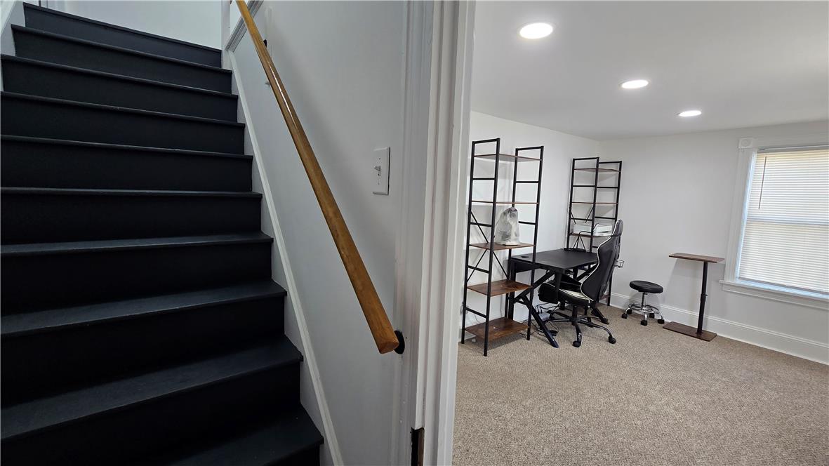 883 North Locust Street Hazleton, PA 18201 - Photo 60 of 83 Well-lit and functional office space with ample shelving and a comfortable workspace.