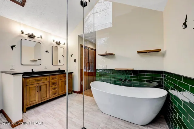 a view of a bathtub in bathroom