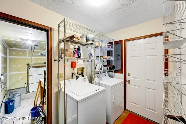 a view of an empty room with a balcony