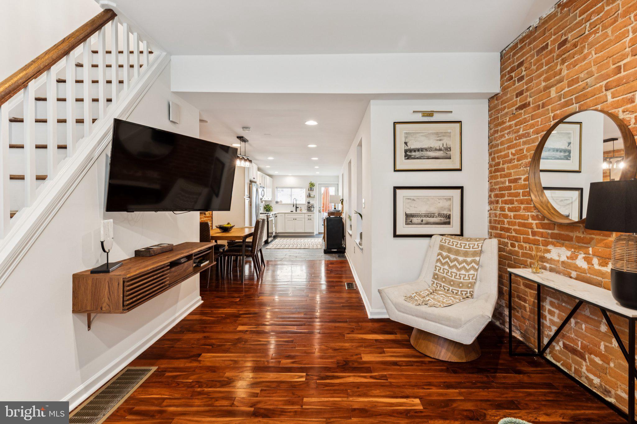 3005 Poplar Street Philadelphia, PA 19130 - Photo 11 of 53 a living room with furniture and a flat screen tv