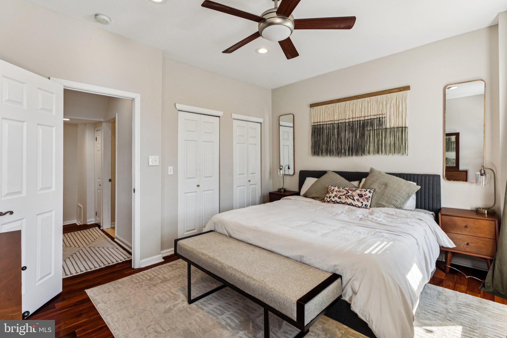 3005 Poplar Street Philadelphia, PA 19130 - Photo 31 of 53 a bedroom with a bed and wooden floor